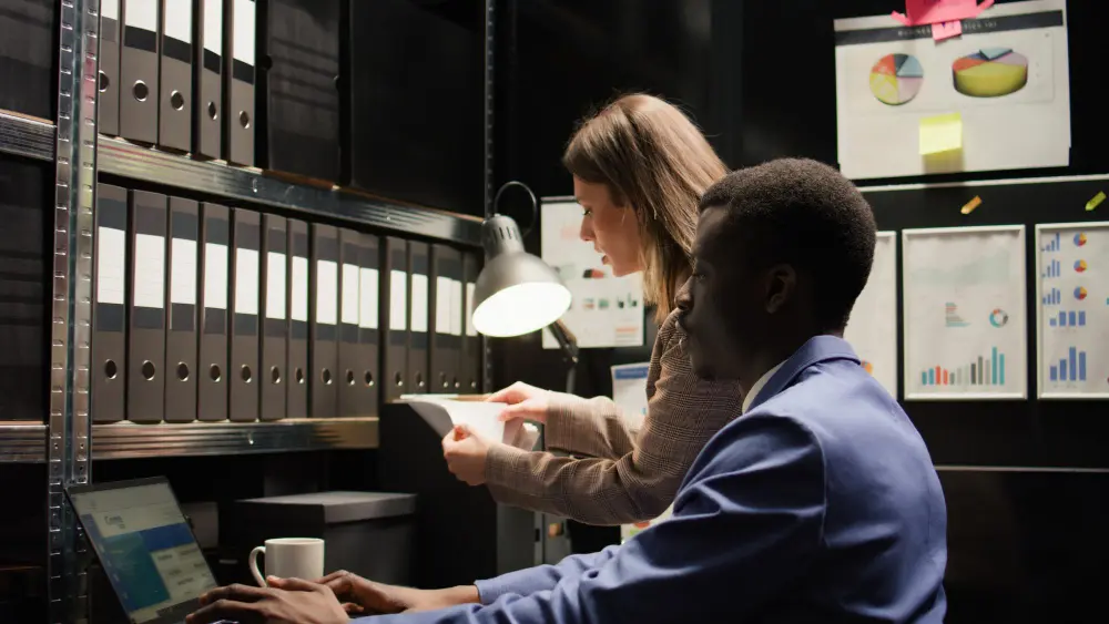 Digital collaboration workspace showing version control system with multiple team members working on synchronized documents