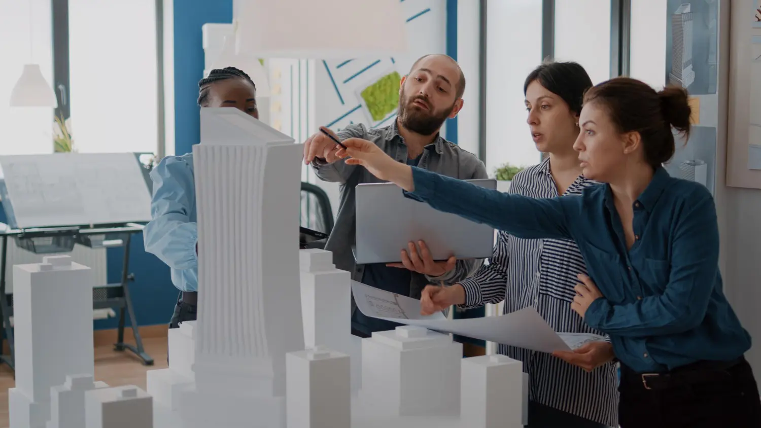 Real estate professionals collaborating on blockchain-secured documents with automated payments and digital signatures